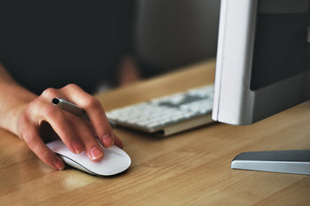 Person using a desktop computer